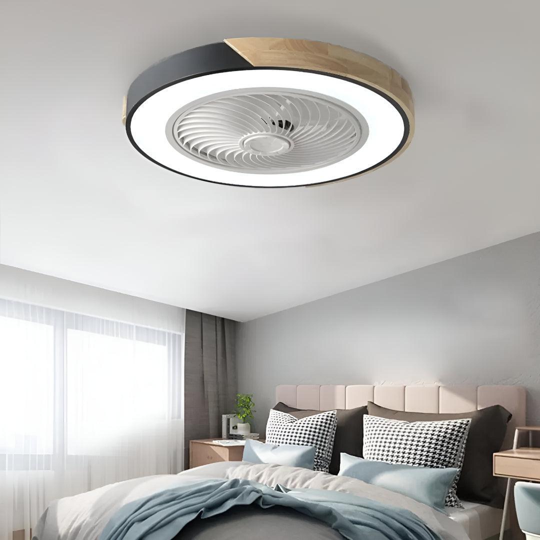 Modern bedroom with a quiet semi flush mount ceiling fan light and natural daylight.
