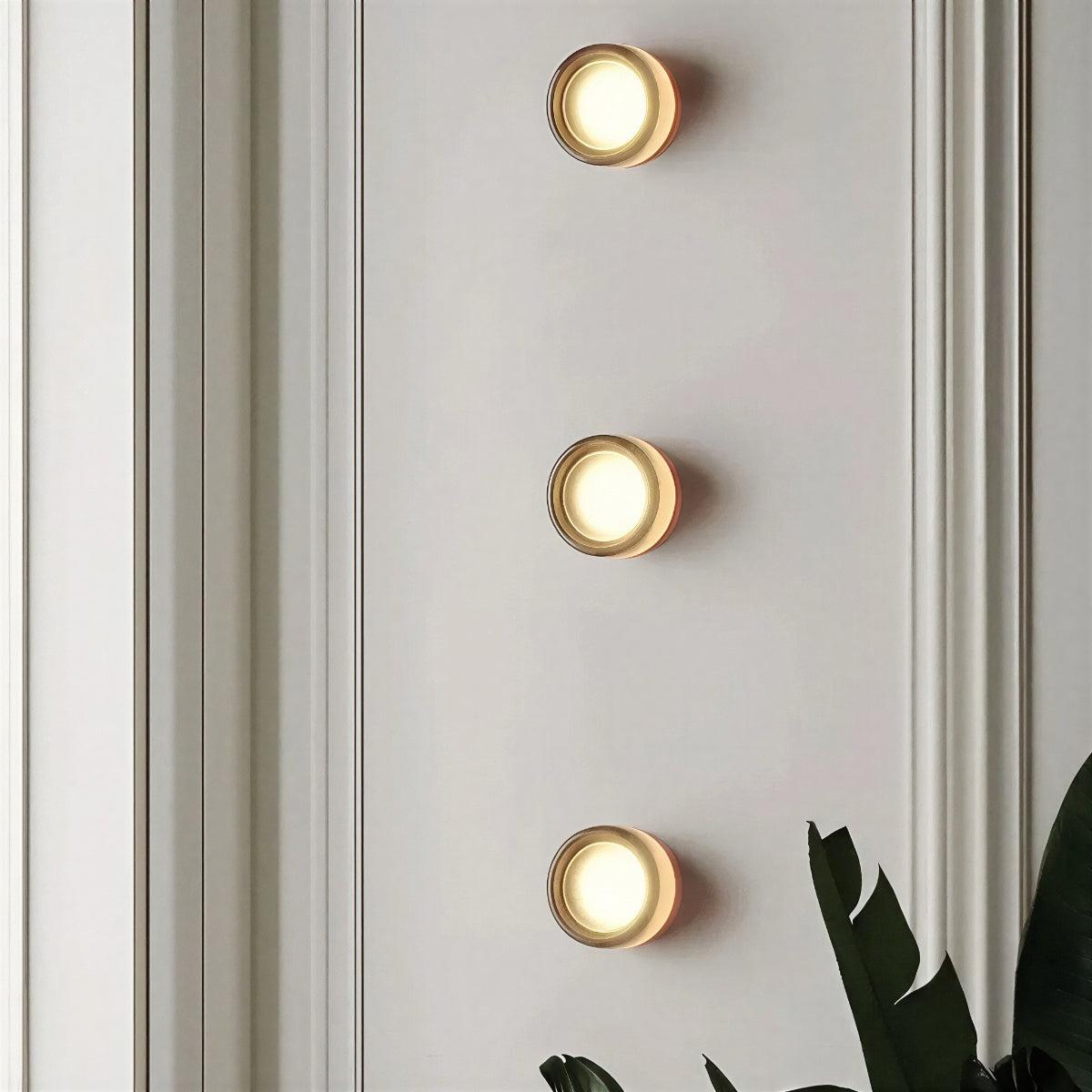 Dimple Wall Sconce Light With Ambient Glow and Round Design